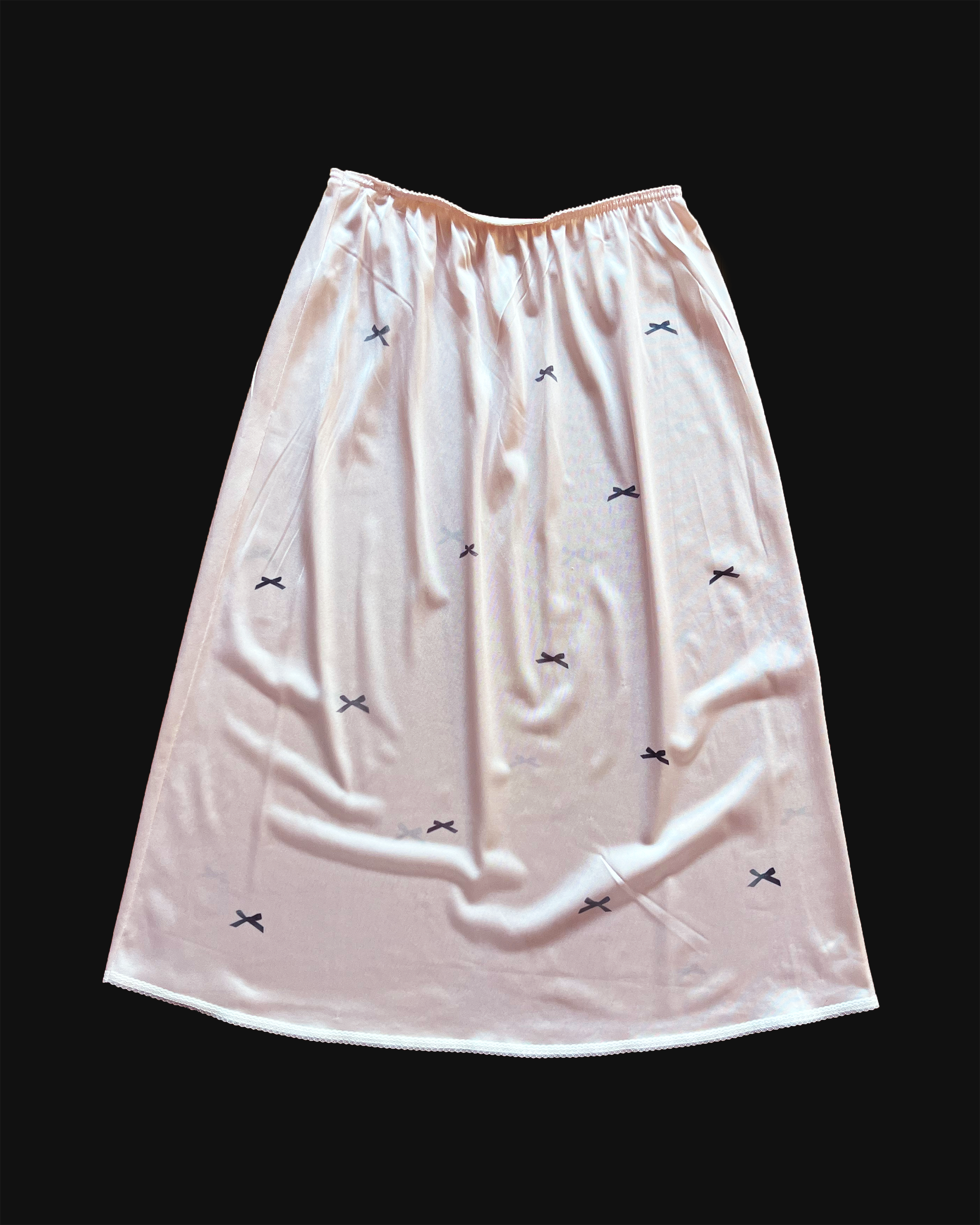 bow slip skirt
