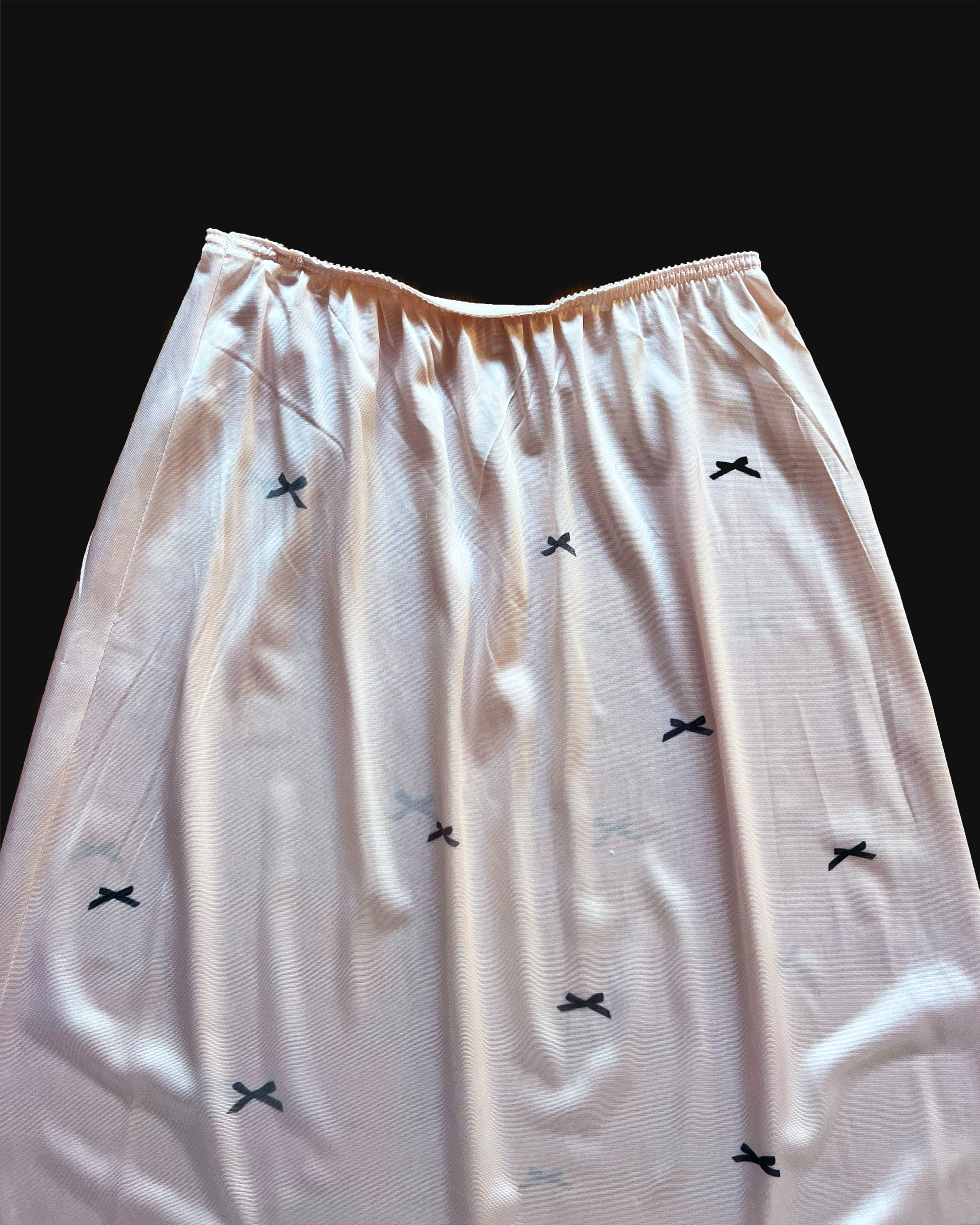 bow slip skirt