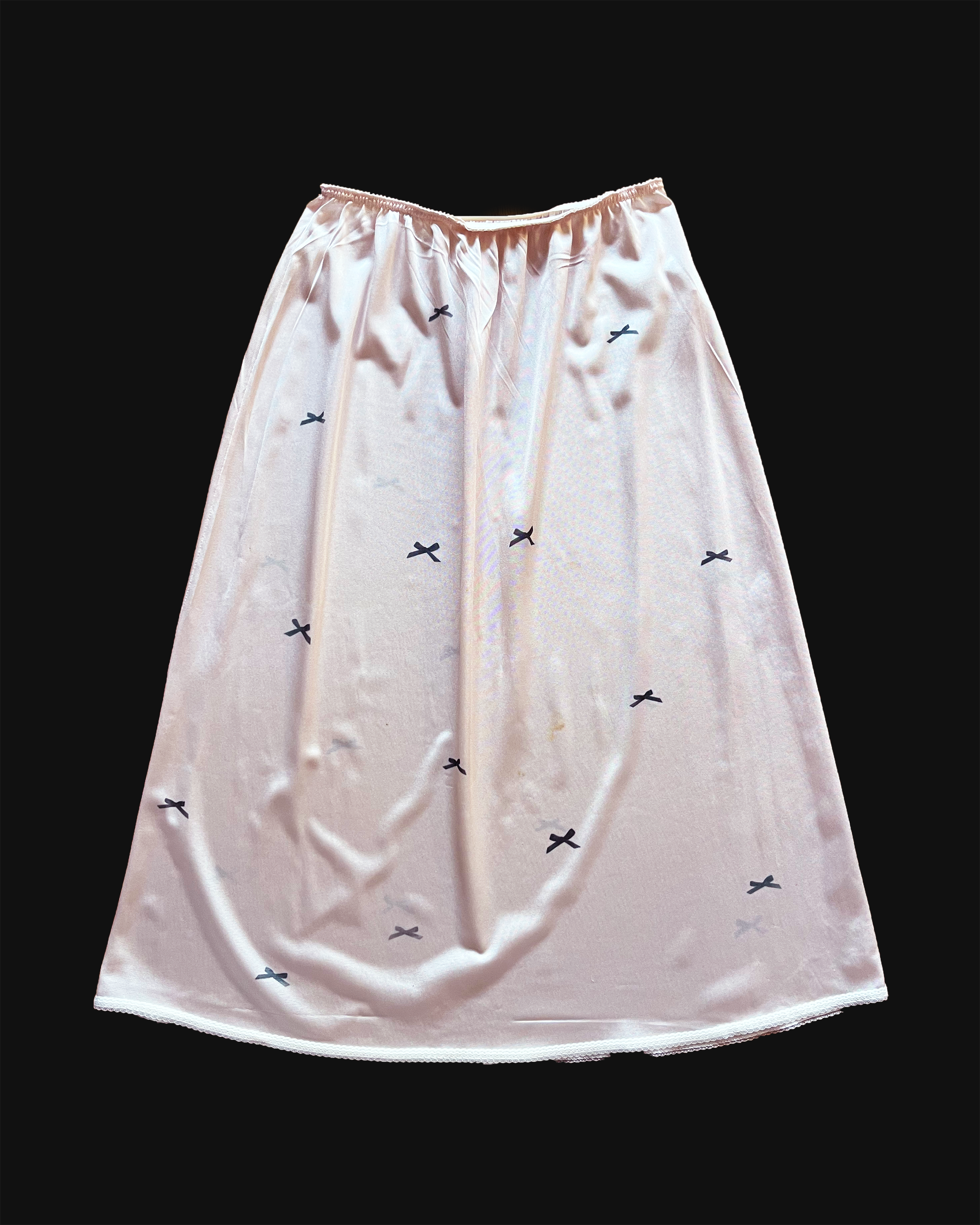 bow slip skirt